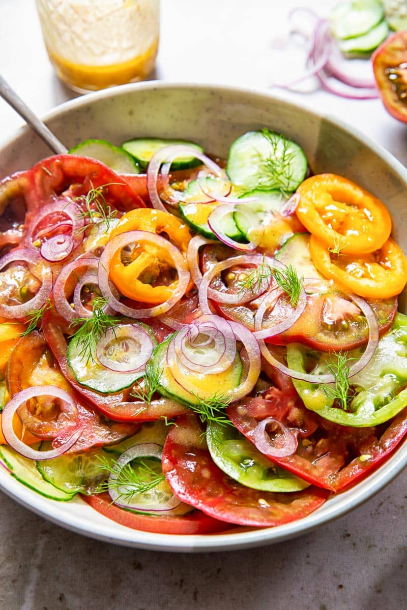 close up of a tomato and cucumber salad