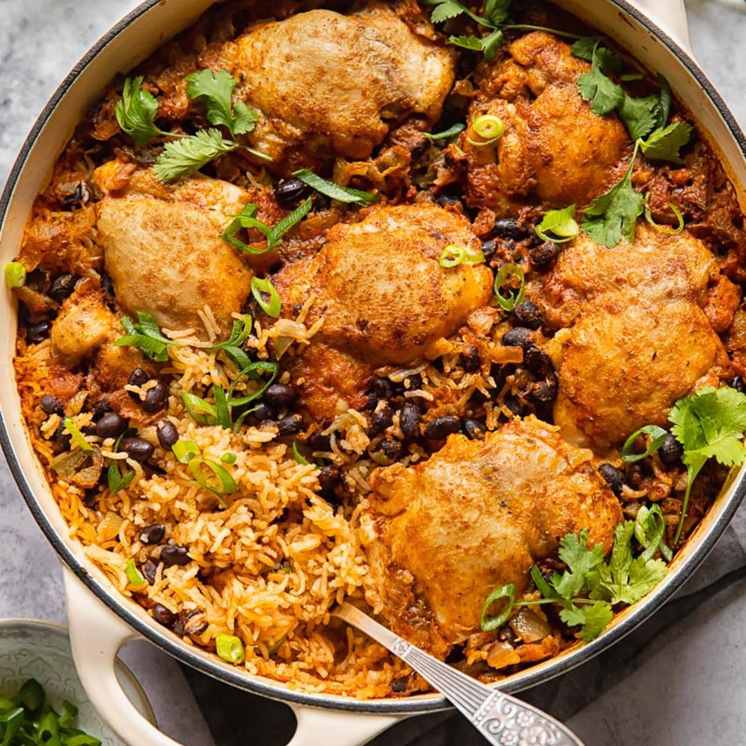 casserole dish with rice, chicken and herbs