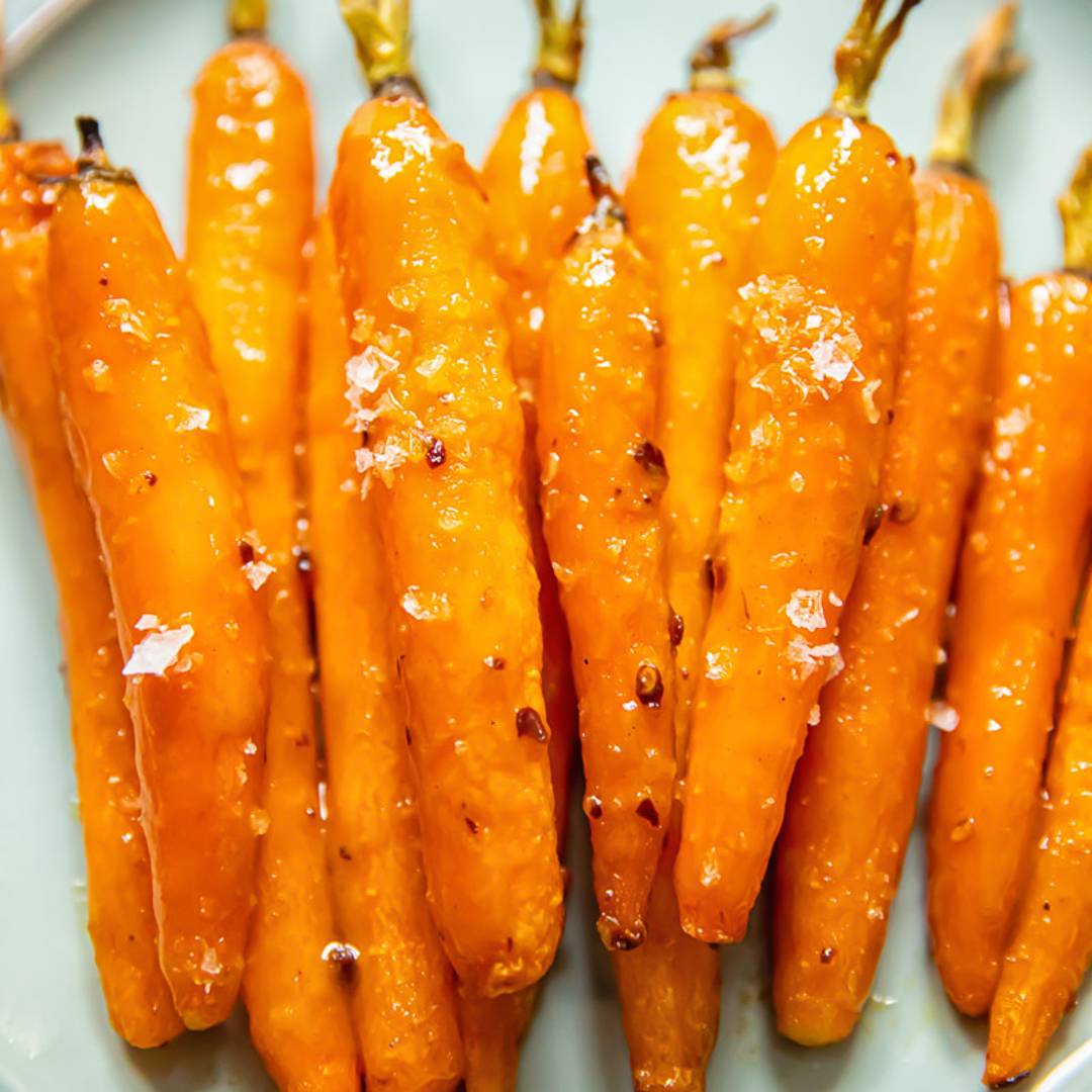 plate with a pile of glazed and roasted carrots