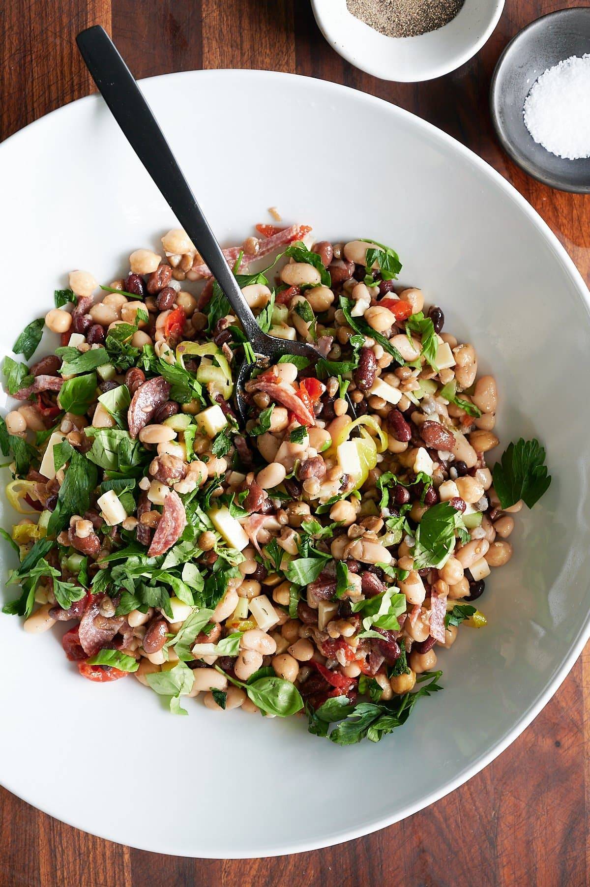 white bowl of dense bean salad
