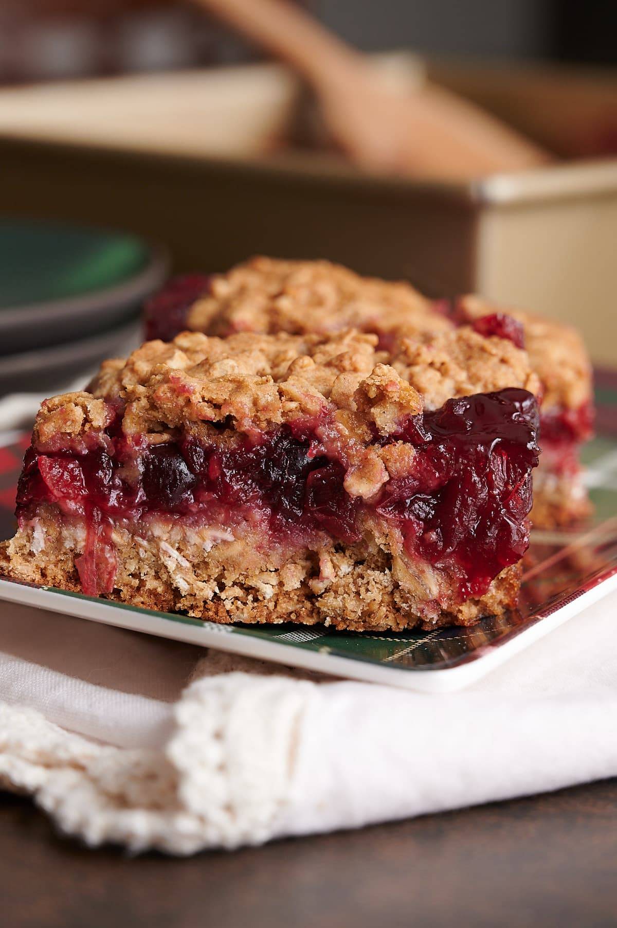 red and green plaid plate with a oatmeal cranberry bar
