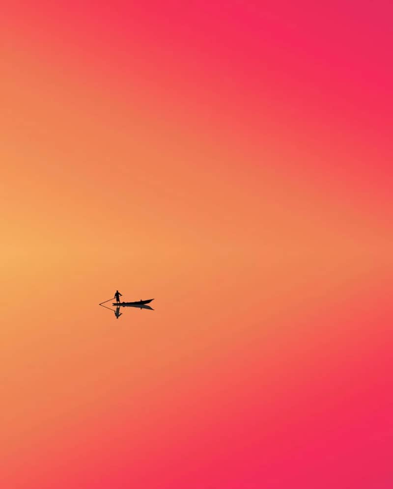A person in a boat on a body of water