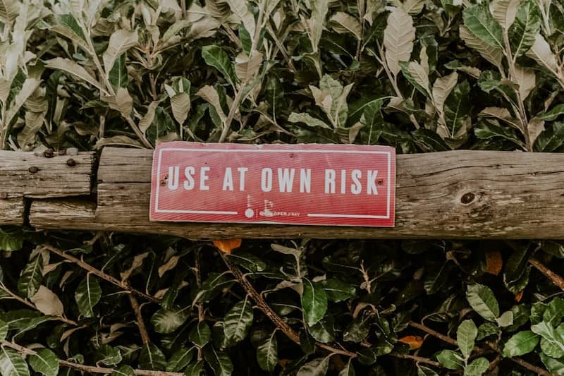 red and white wooden signage