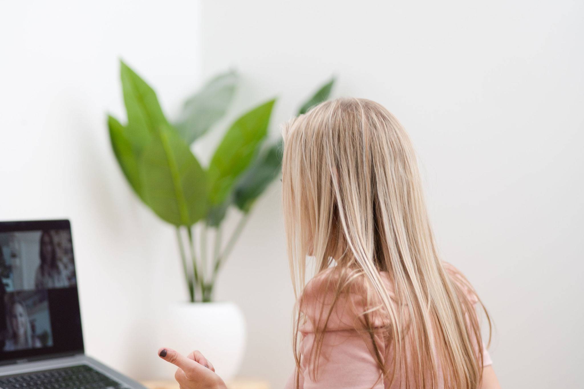 Erin meeting with friends on a video call