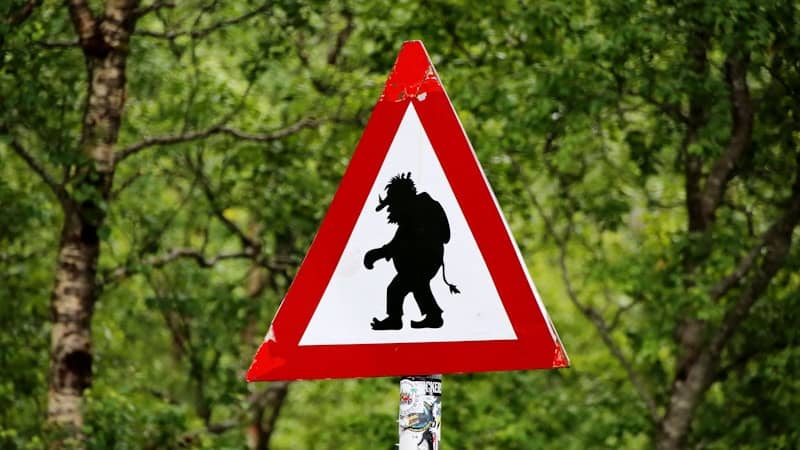 red and black troll signage