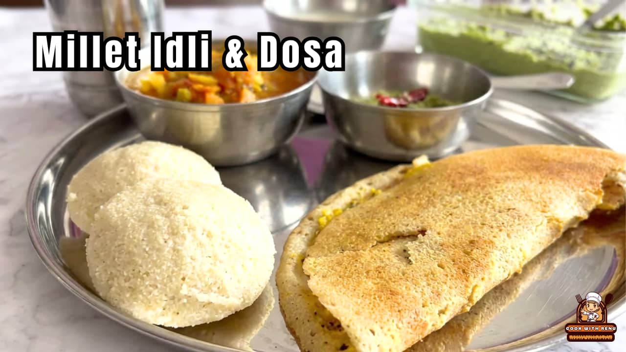 Image showing a South Indian Thali with Idli, Sambar, Chutney and Dosa in clockwise direction, starting from the left.