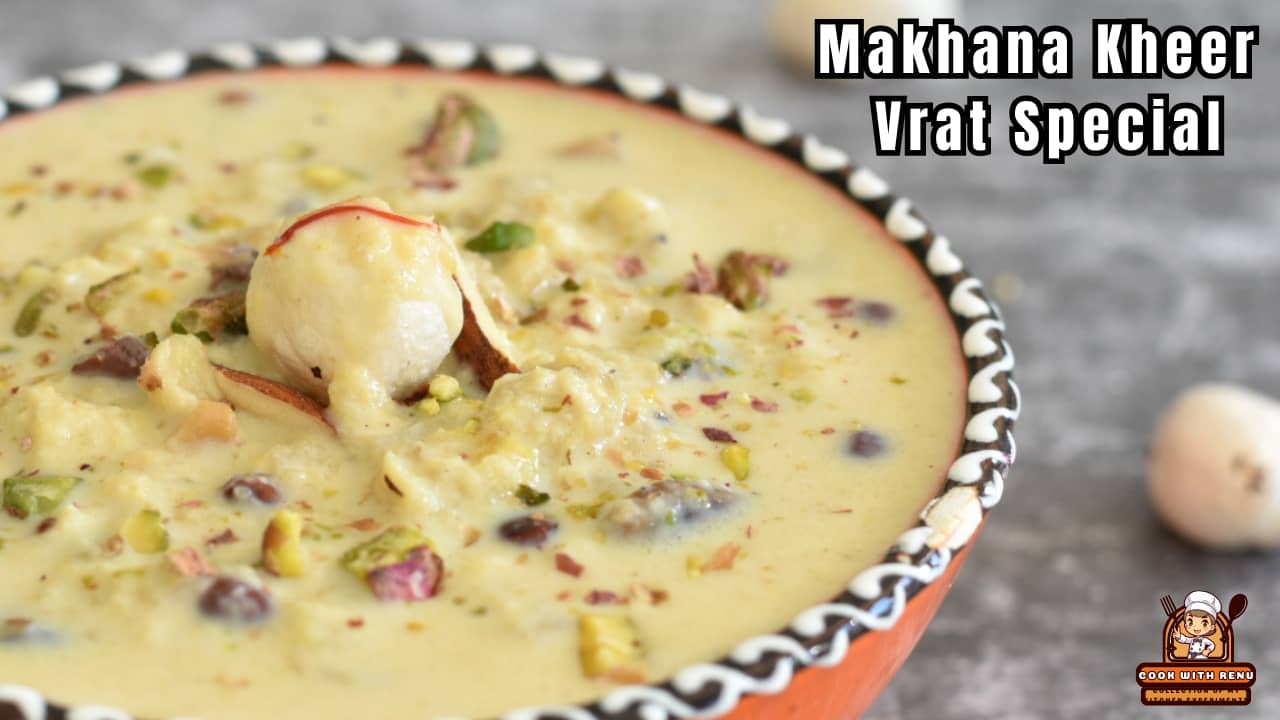 Makhana Kheer served in a designer orange bowl, with a generous garnish of nuts.