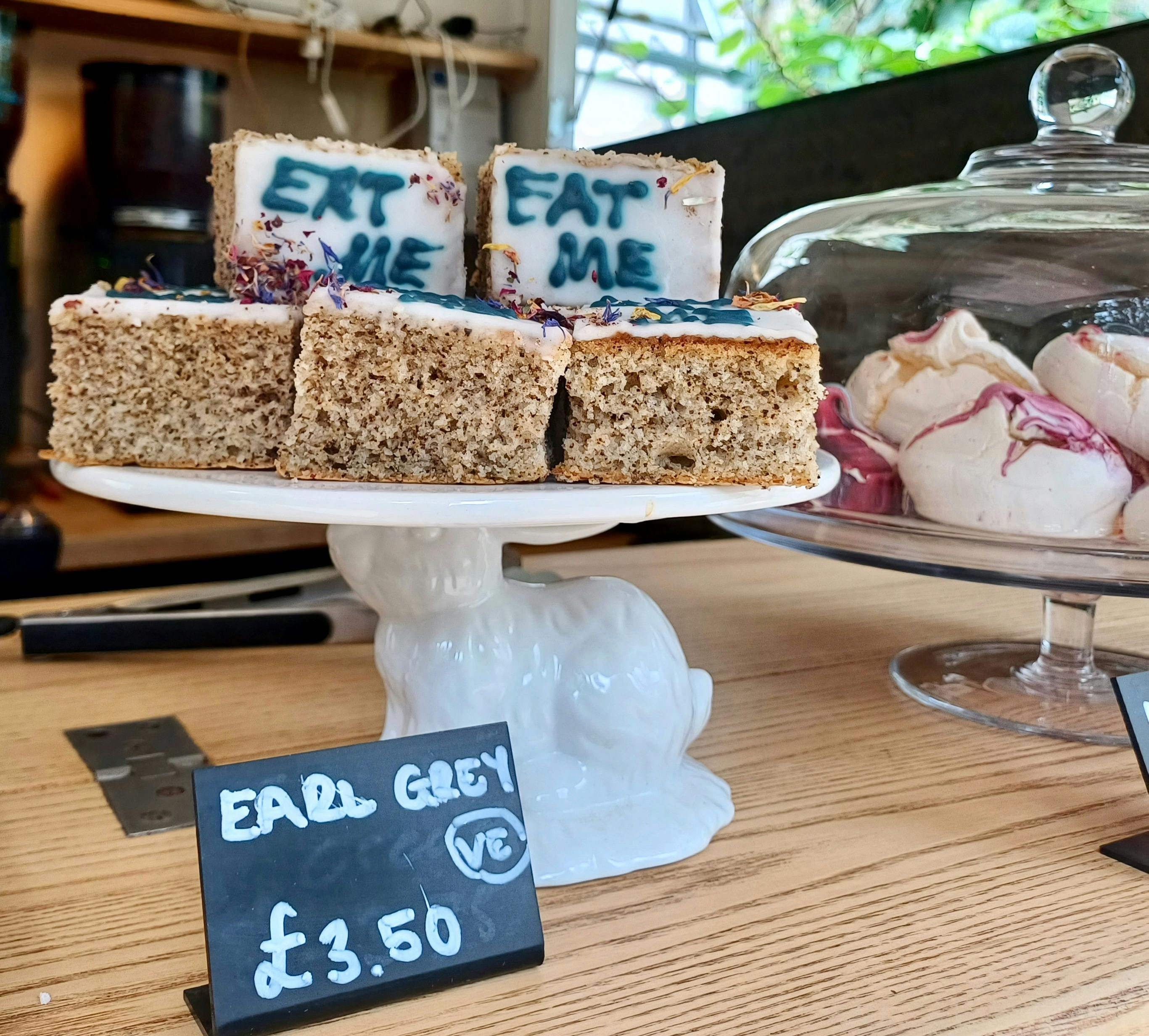 Cakes with eat me written on them from Alice in Wonderland