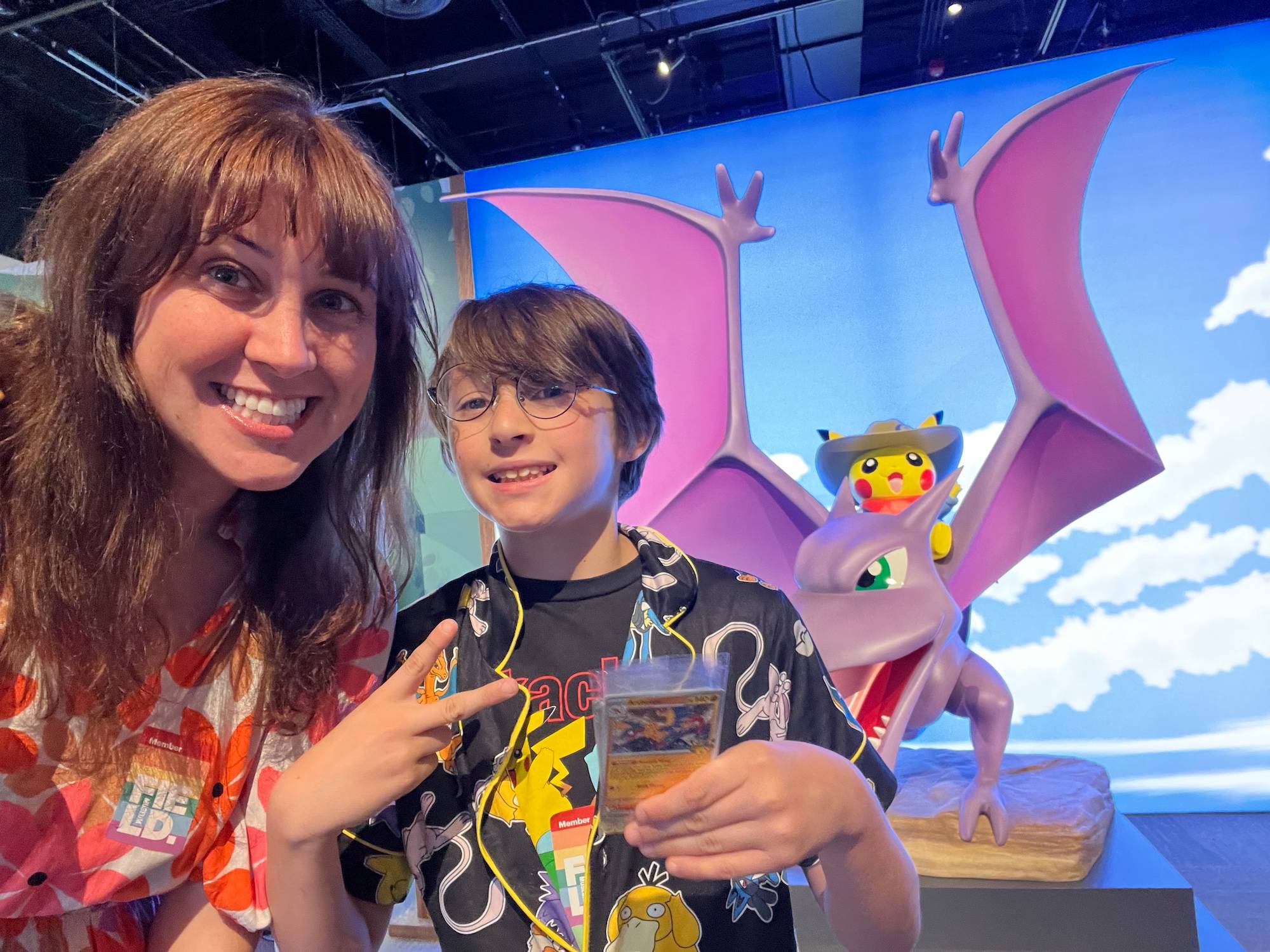 Brittany posing with her son, Kadoh at the Pokemon Fossil Museum