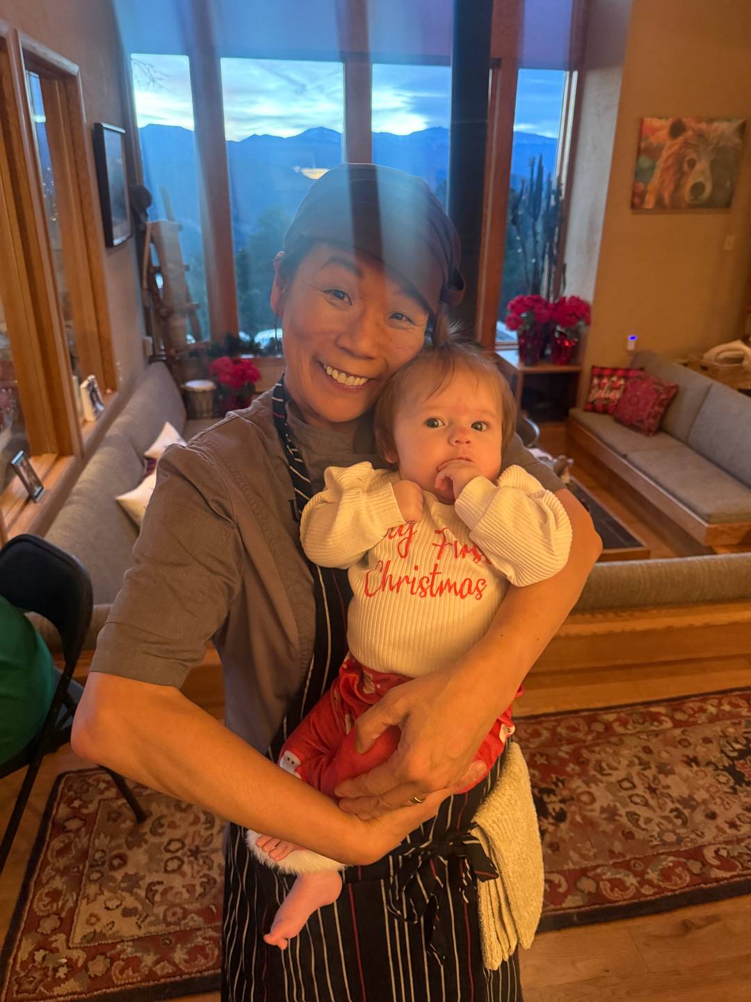 A female chef and a baby girl