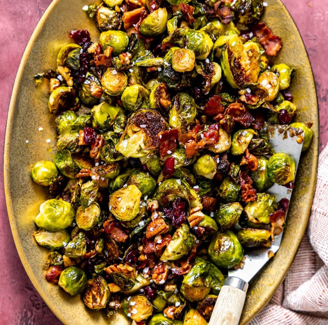 Plate filled with roasted brussels sprouts. 