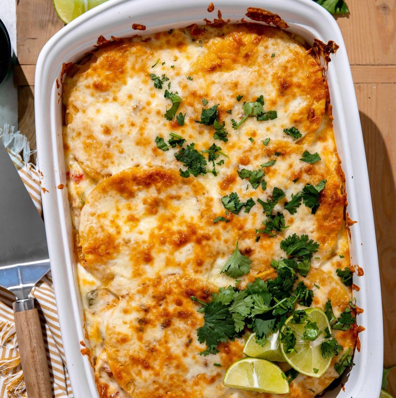 King Ranch Chicken Casserole topped with cilantro and avocado. 