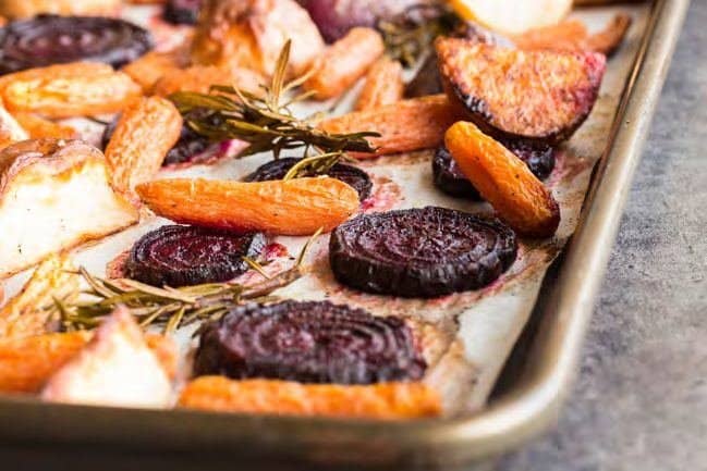 Roasted beets and carrots on a sheet pan