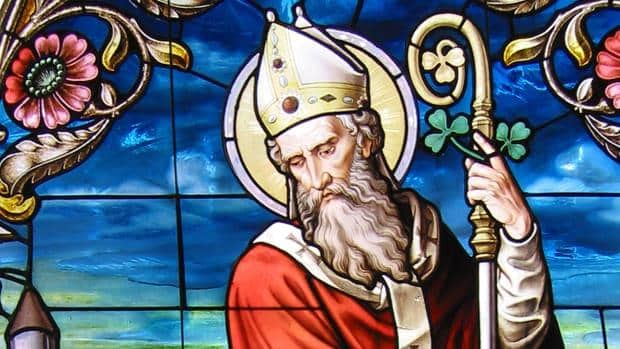 A stained glass image of Saint Patrick.