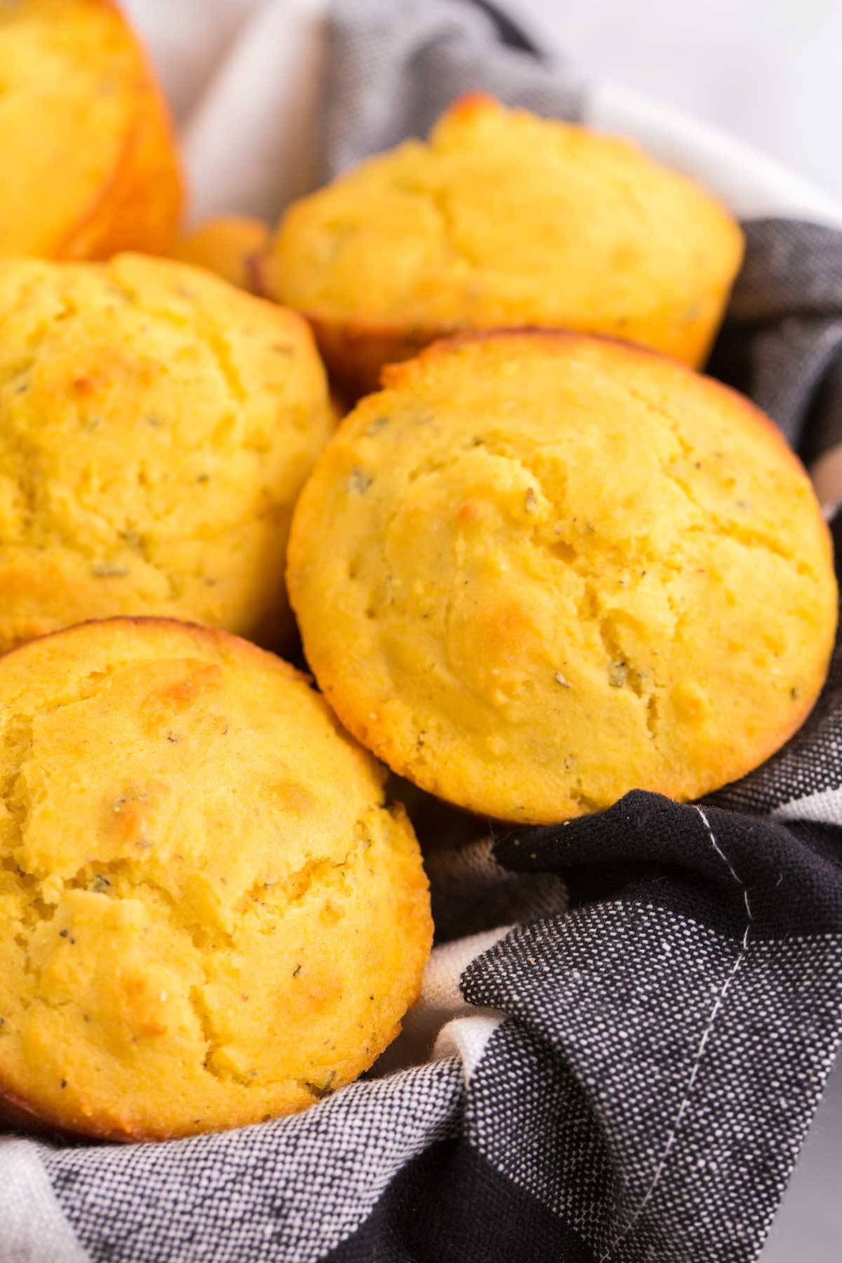 A basket of cornbread muffins.