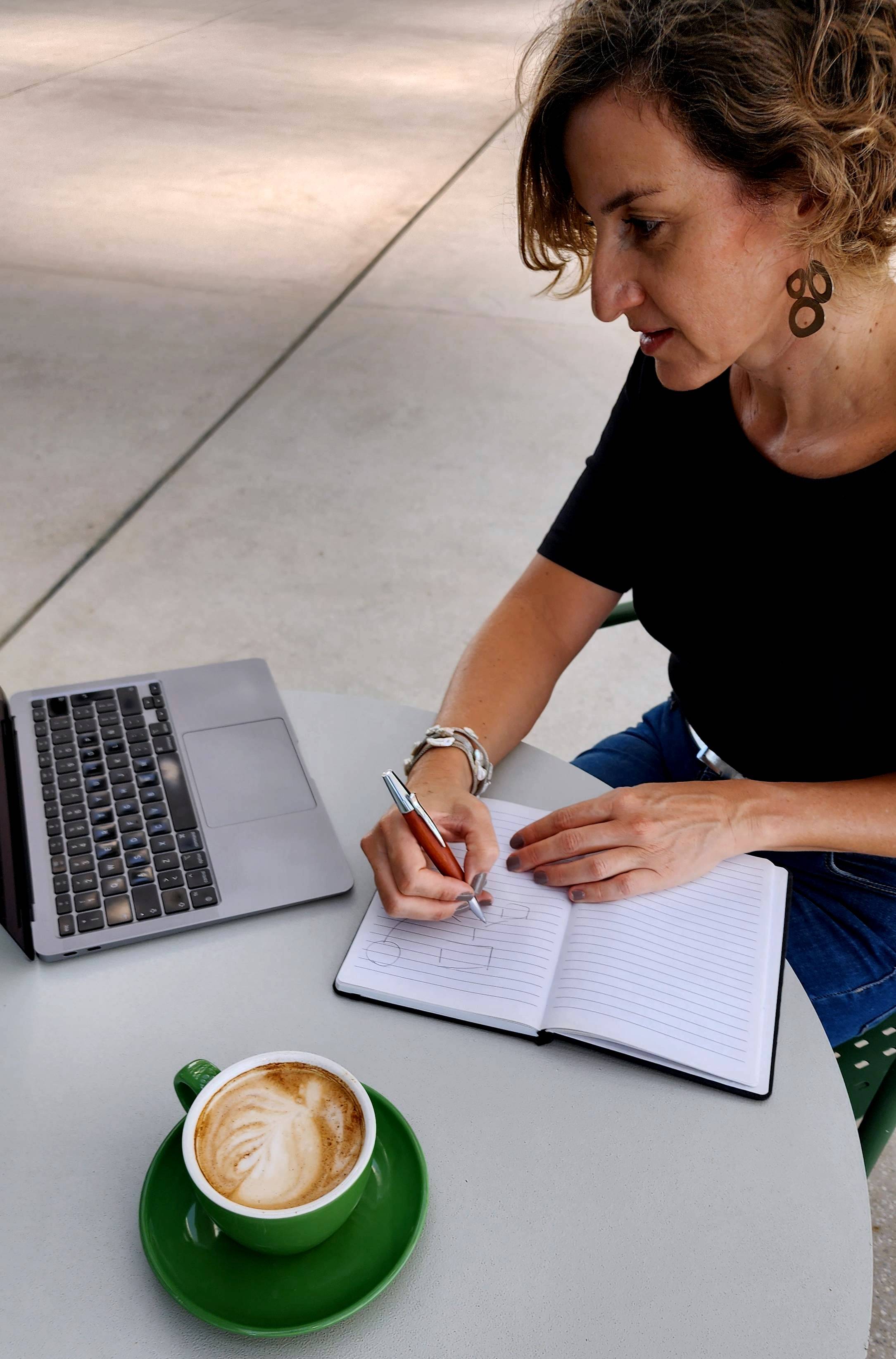 Espresso being poured into a glass.