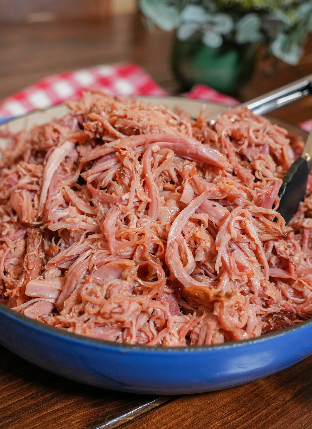 A pile of tender, moist pulled ham ready for making sliders. 