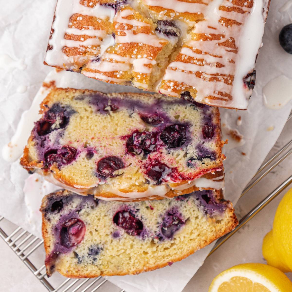 partially sliced blueberry ricotta loaf cake
