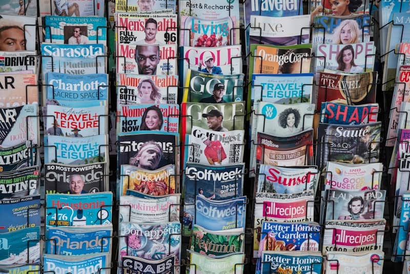 A pile of newspapers stacked on top of each other