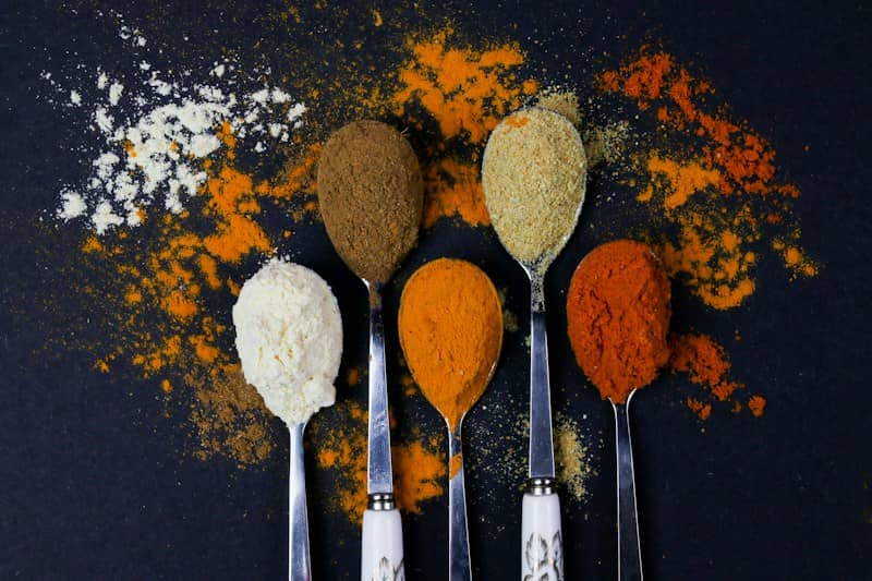 brown powder on silver spoon