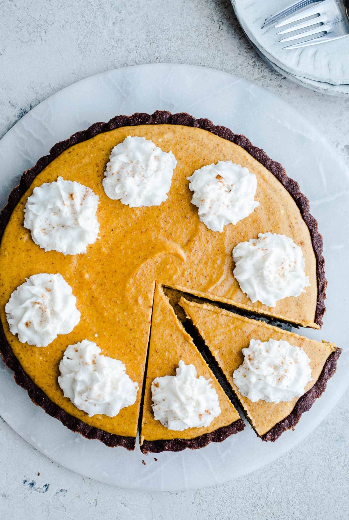Pumpkin mousse pie with whipped cream.