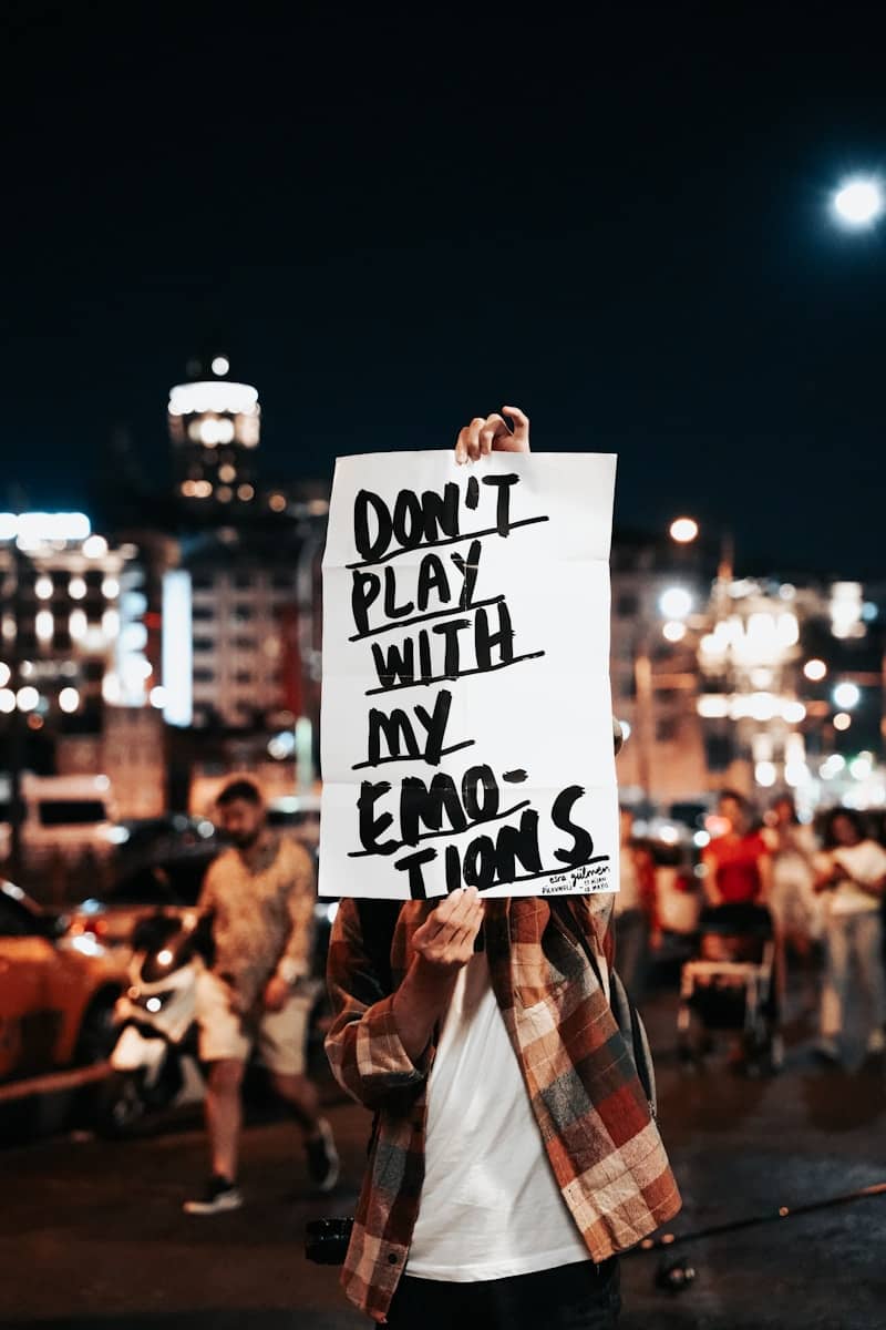 a person holding a sign