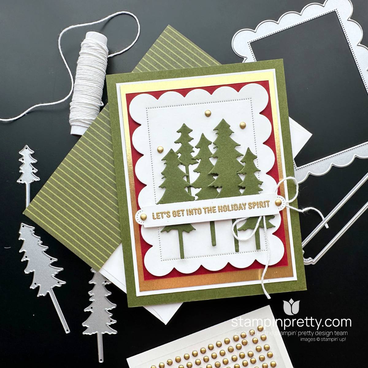 Handmade Christmas card featuring Mossy Meadow evergreen trees, a Basic White scalloped frame, rich red layers, gold accents and a gold-embossed holiday sentiment.
