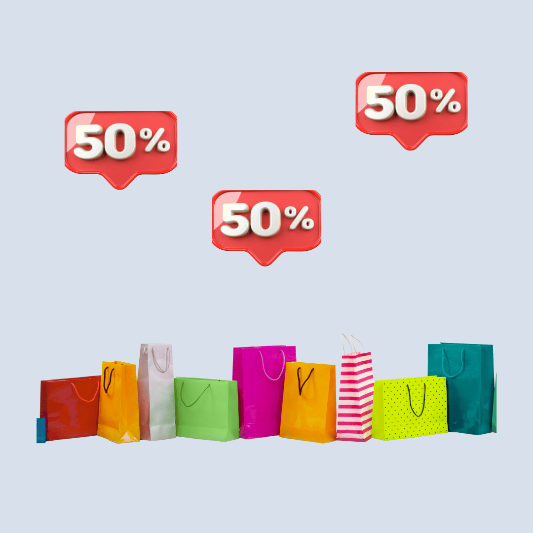A row of colorful shopping bags with three 50% off signs hovering above them