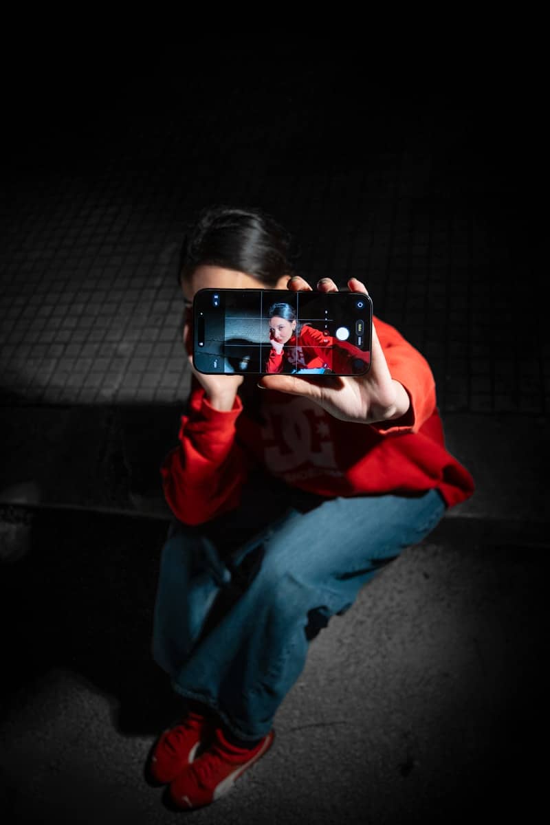 Person taking a selfie with a smartphone