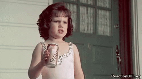 Darla from the Little Rascals crushing a can in frustration