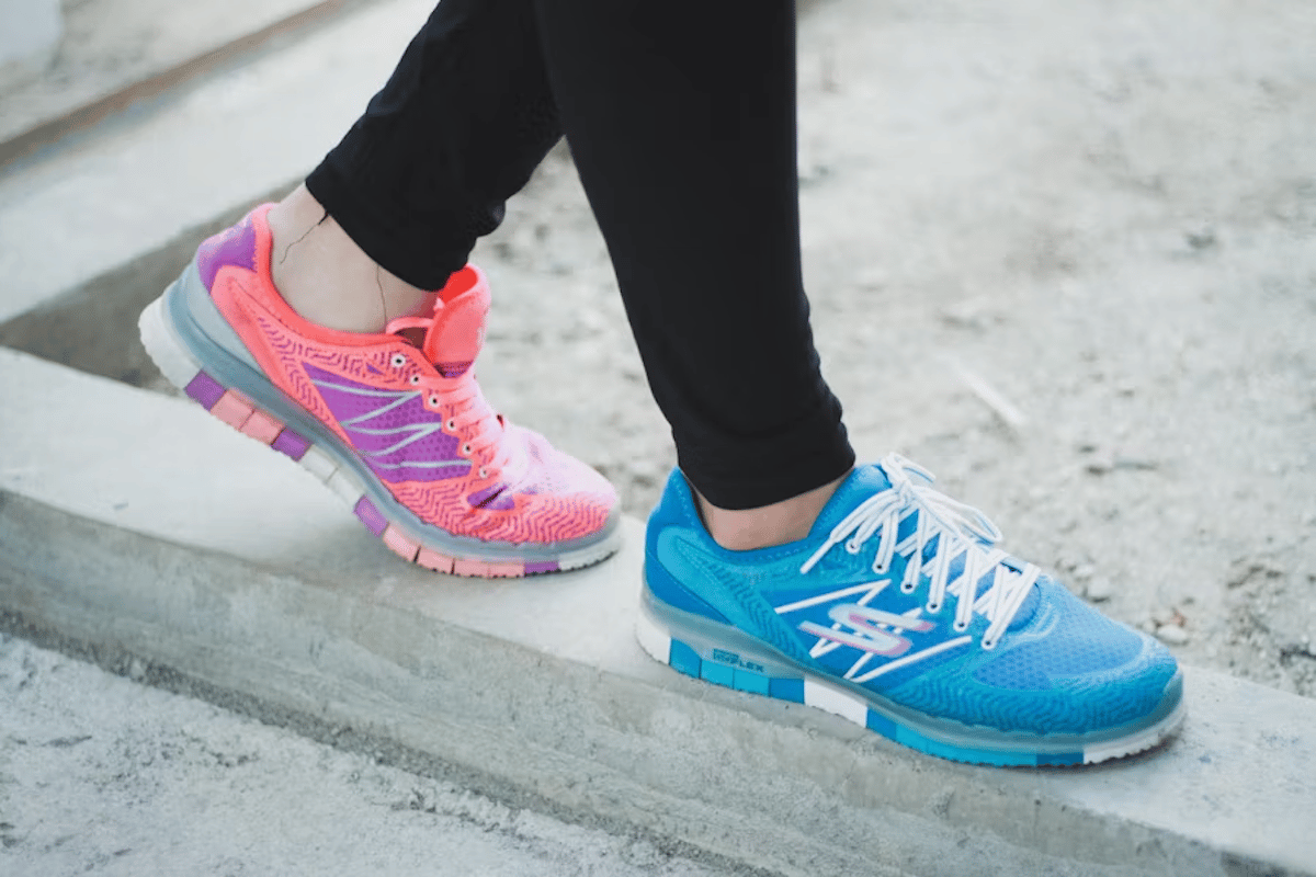 Woman walking with skechers' shoes, best stocks to buy, learn a trade
