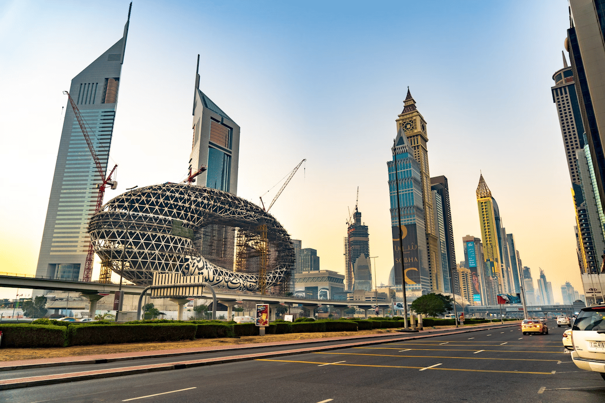 Dubai United Arab Emirates main avenue and skyscrapers, best stocks to buy, learn a trade