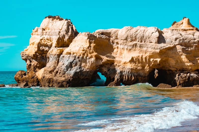 Rock formations at a beautiful turquoise beach.