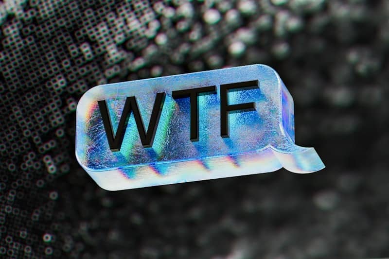 A close up of a text bubble with the word wtf on it
