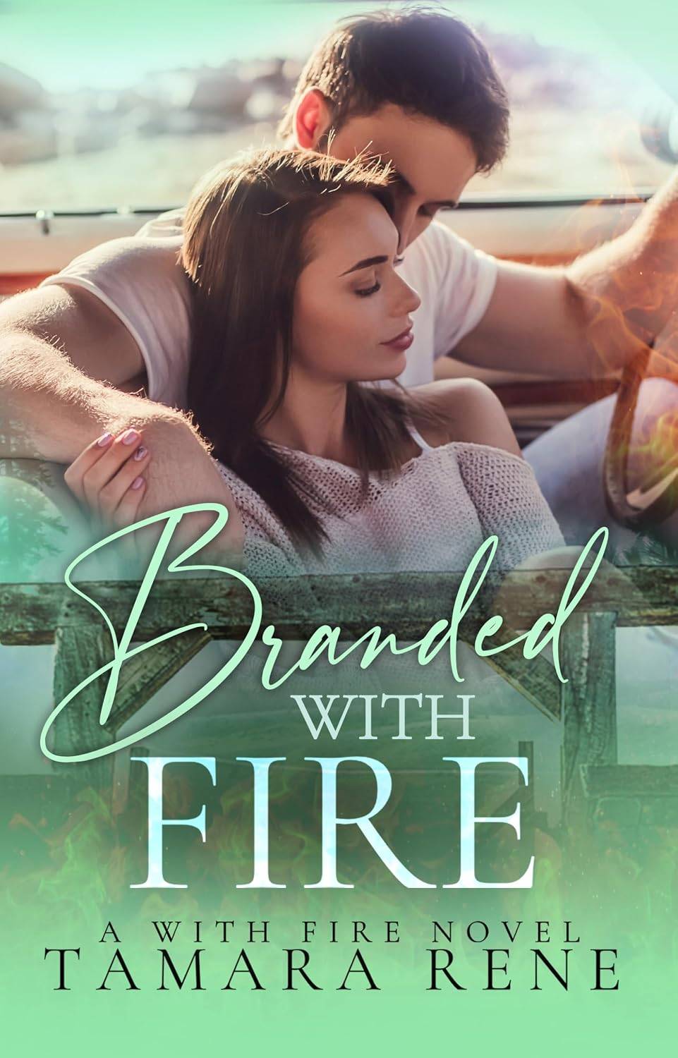 Cover of Branded with Fire by Tamara Rene: a With Fire Novel. Image features a caucasian couple where the woman with brown hair is leaning against the man who has his arm around her in a convertible car.