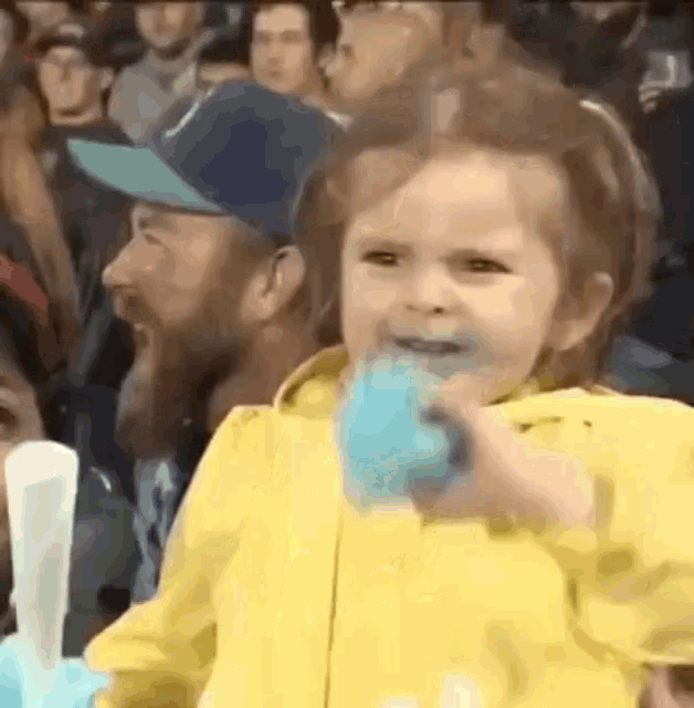 little girl excited with cotton candy GIF