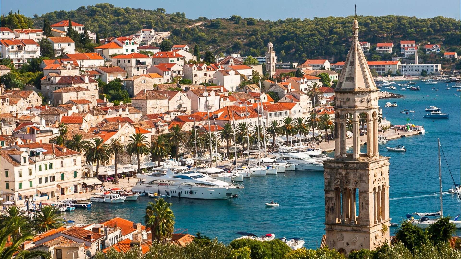 Hvar Town harbor, with the Spanish Fortress rising above — one of the itinerary's signature views.