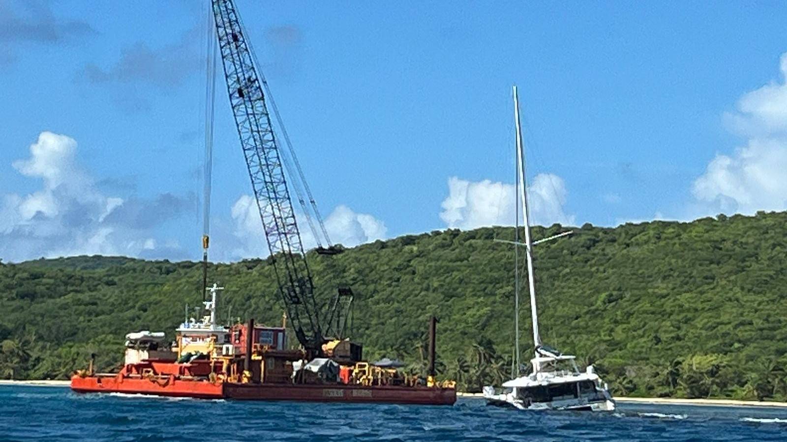 The Resolve Marine barge crane on site at Flamenco Beach | Source: USCG