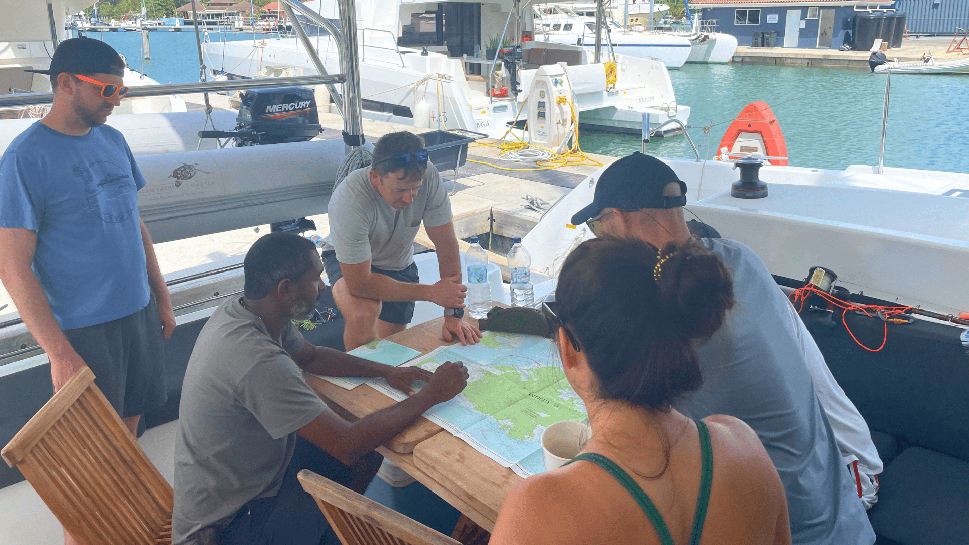 The team going over the charts before setting sail - this is how every float plan starts.