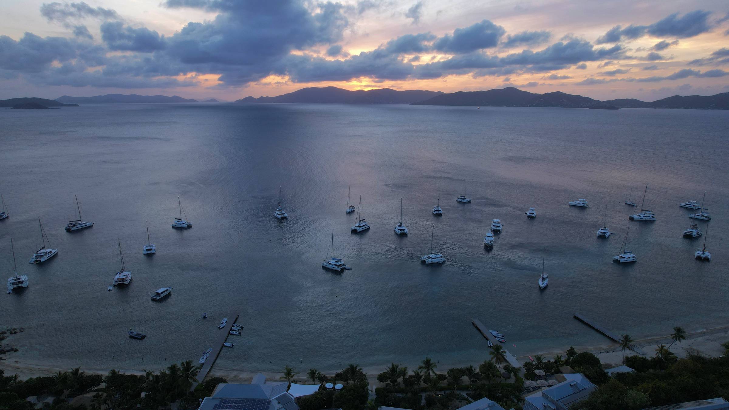 many boats anchored in Cooper Island 