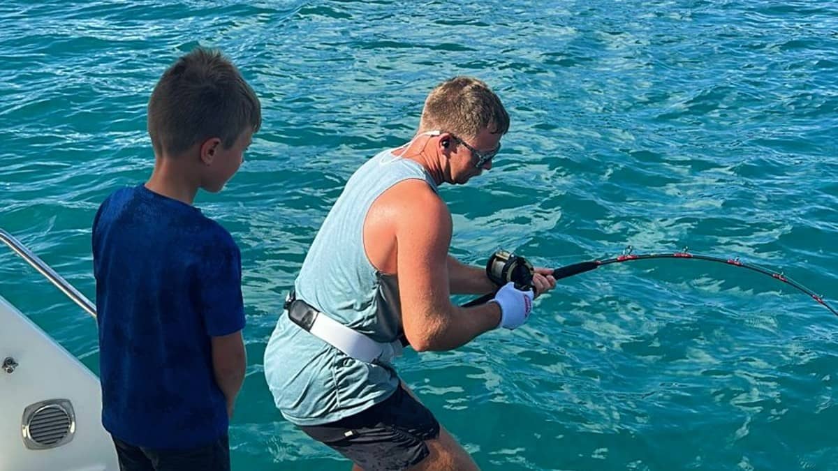 Reeling in a monster 'cuda we caught in North Sound this past June