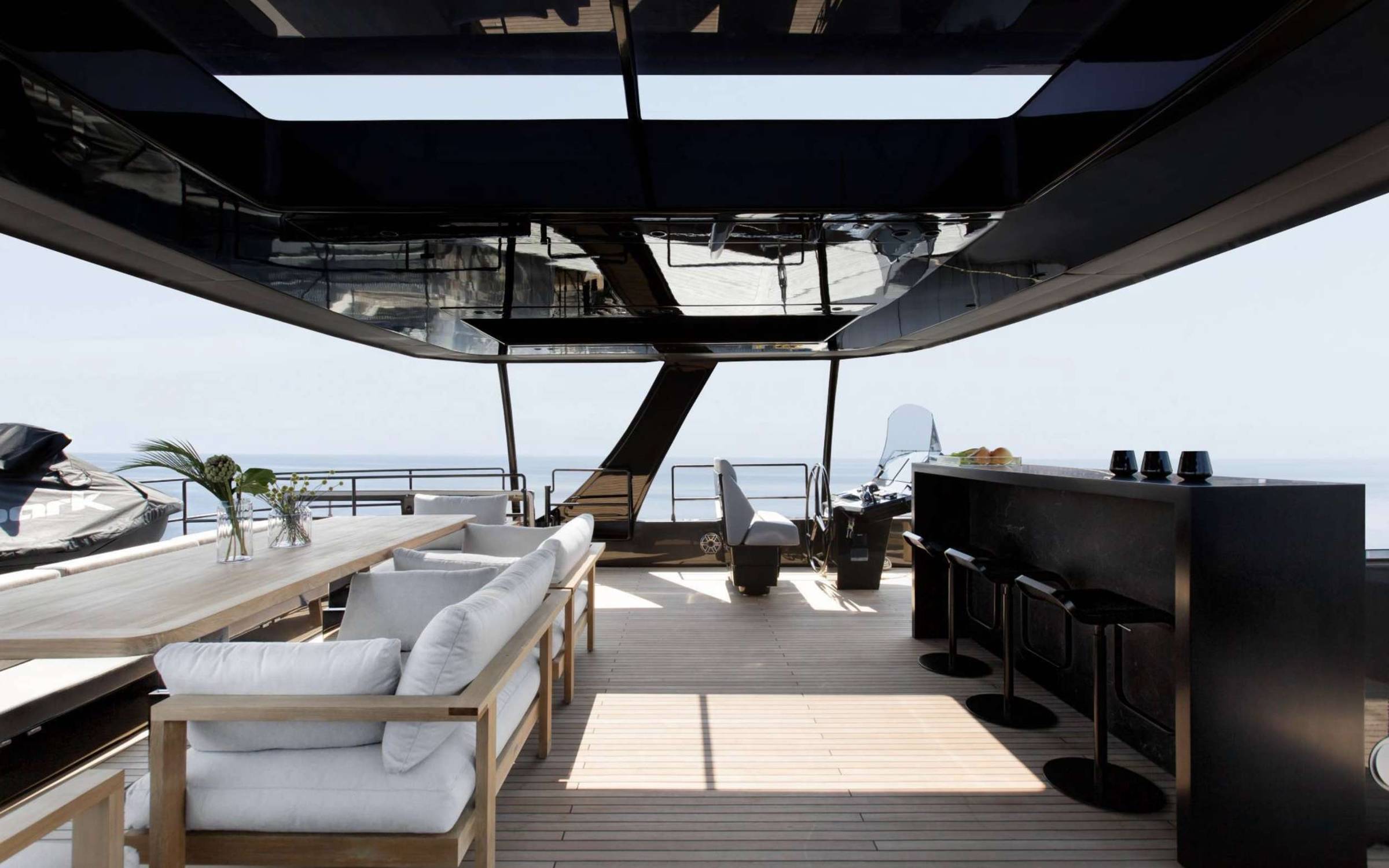 Upper deck The upper outdoor area is where GRAYONE really shines. A full bar, alfresco dining, open sky, and nothing but water ahead.