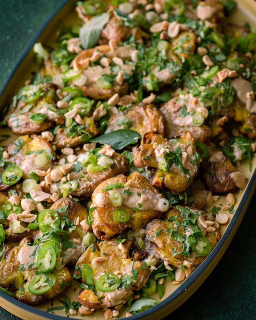 crispy smashed potatoes with ginger tahini dressing