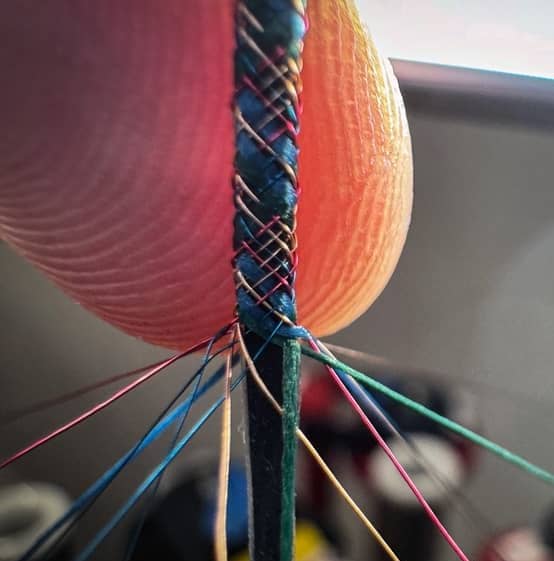 Caption:Researchers braid a computer fiber with a combination of metal and textile yarns. Covering the fiber computer with traditional yarns enables it to be easily integrated into fabrics and textiles. Credits:Credit: Hamilton Osoy, IFM