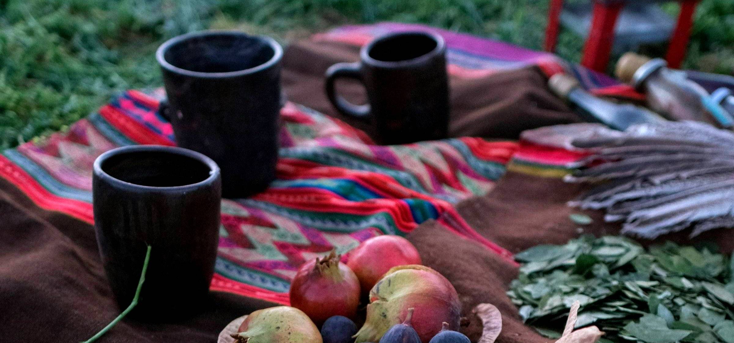 Ceremonial cacao mugs prepared for a Full Moon Beltane gathering, inviting heart-opening connection, warmth, and sacred ritual.