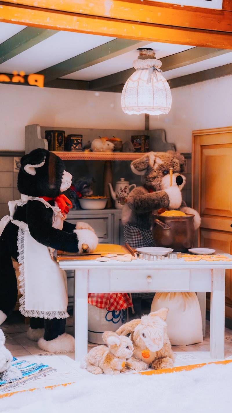 A couple of stuffed animals sitting on top of a table