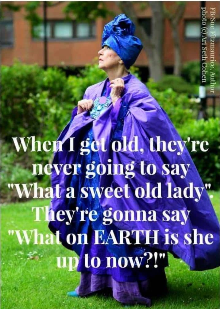 An older woman in purple