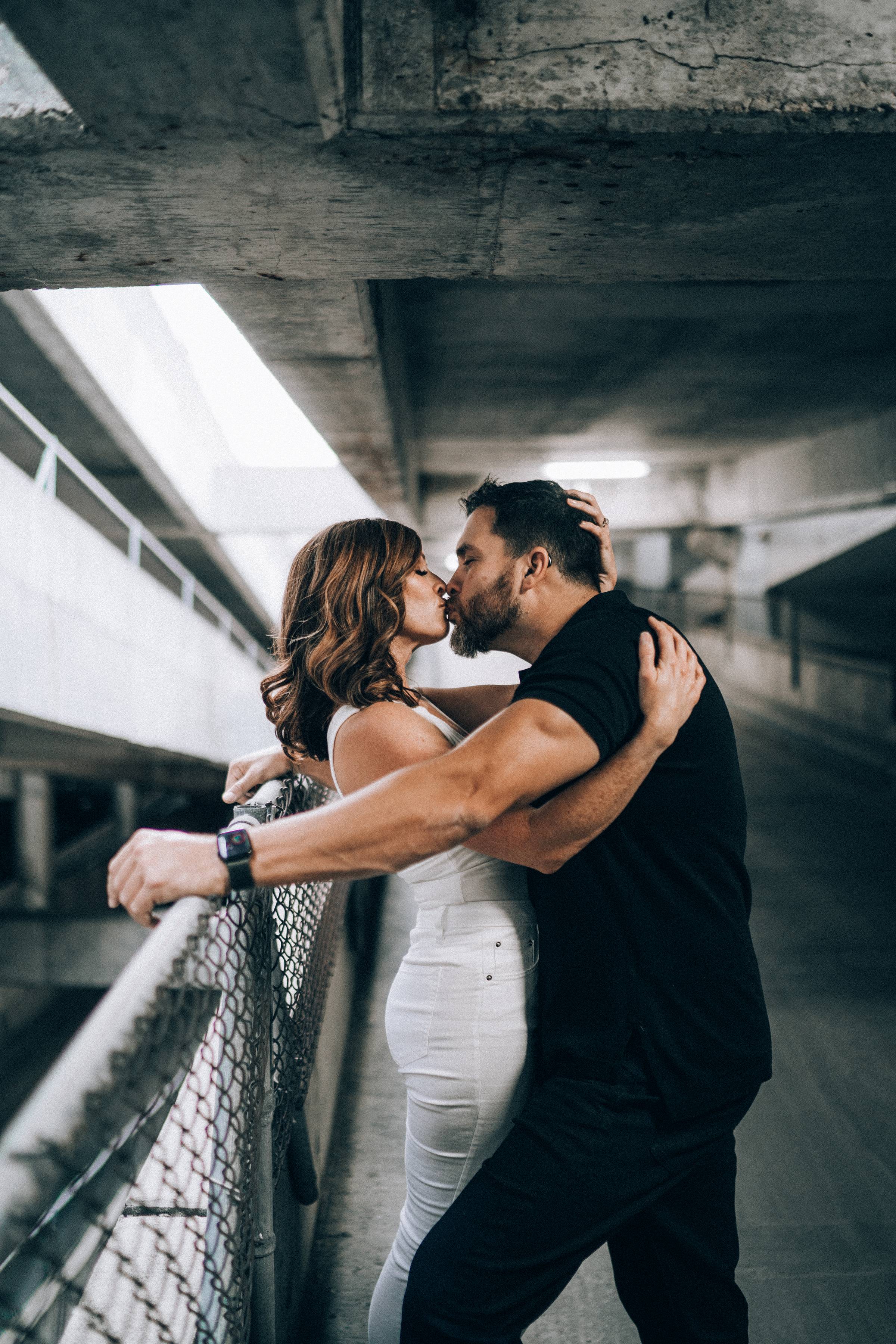 Shannon and Rene smiling together during a casual outdoor portrait session, showcasing their Deaf-hearing relationship and love story featured in the America’s Favorite Couple 2025 competition