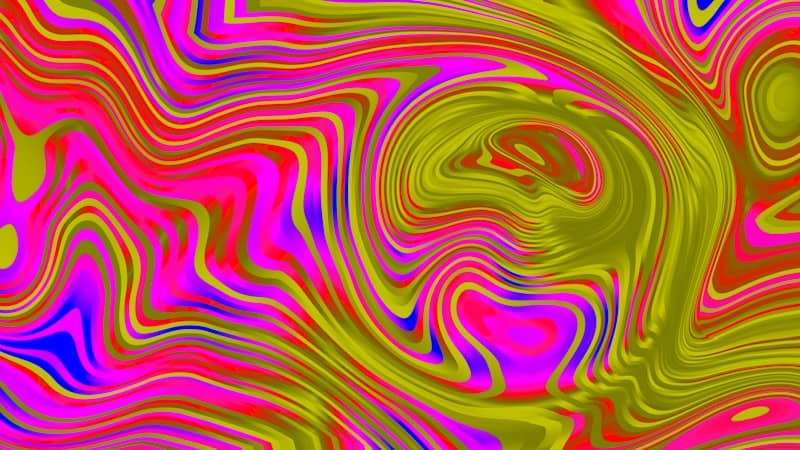 Vibrant abstract swirl of pink, green, blue, and yellow colors.