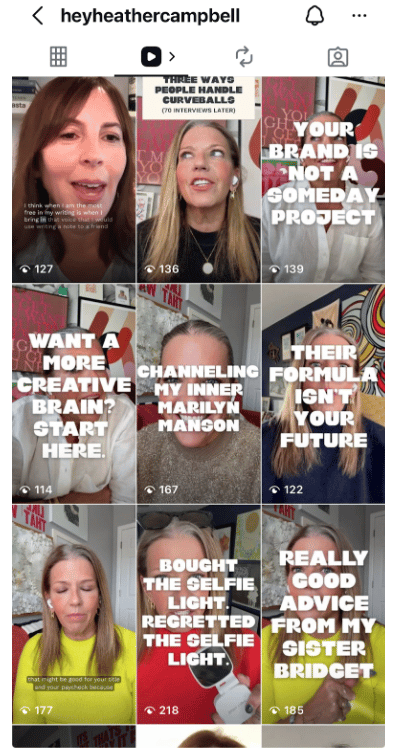 Screenshot of an Instagram profile grid for user “heyheathercampbell,” showing multiple video thumbnails of a woman speaking to camera. Each thumbnail features bold text overlays with topics like creative business advice, personal growth, and branding, along with view counts and engagement icons.
